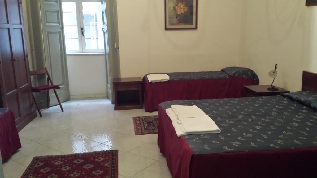 Posteľ alebo postele v izbe v ubytovaní B&B Miseria e Nobilta'