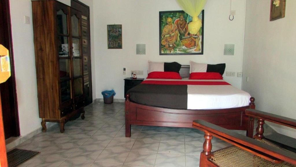 Postel nebo postele na pokoji v ubytování Sankarest Villa