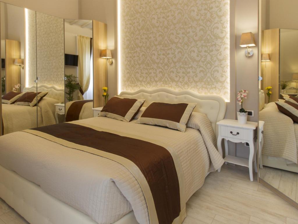 Un pat sau paturi într-o cameră la Locanda di Mosconi