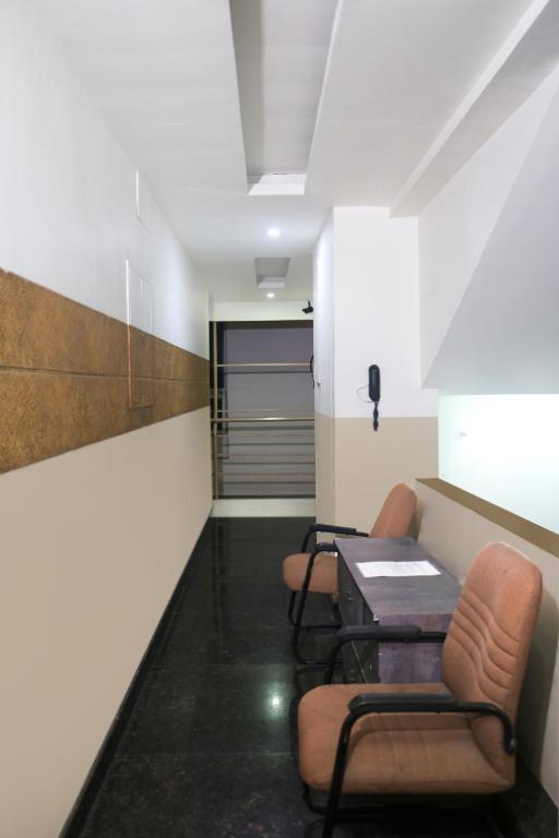 Posezení v ubytování Hotel Sapthagiri Nest