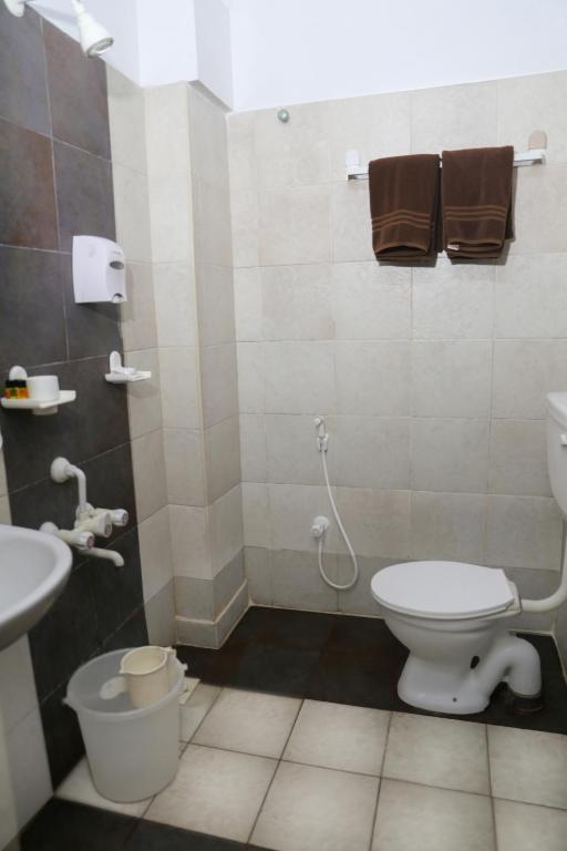 Koupelna v ubytování Hotel Sapthagiri Nest