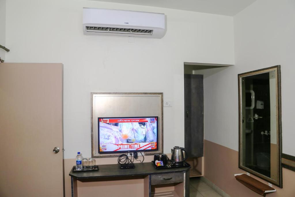 TV a/nebo společenská místnost v ubytování Hotel Sapthagiri Nest