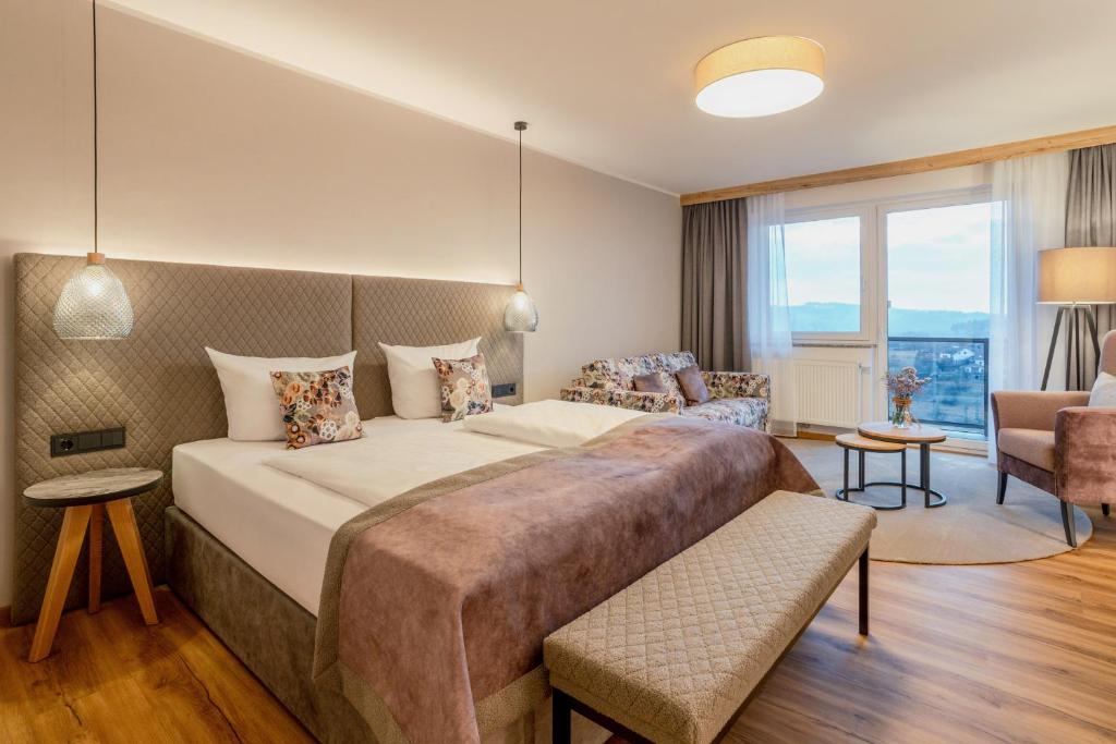 Postel nebo postele na pokoji v ubytování Natur- und Wohlfühlhotel Kastenholz