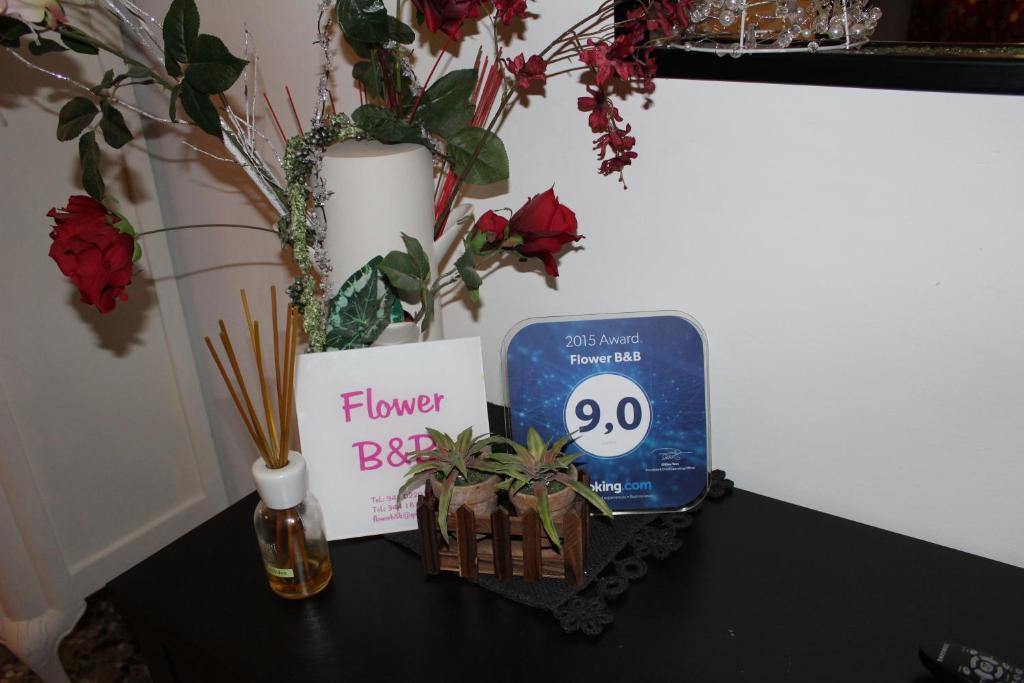 Certifikát, hodnocení, plakát nebo jiný dokument vystavený v ubytování Flower