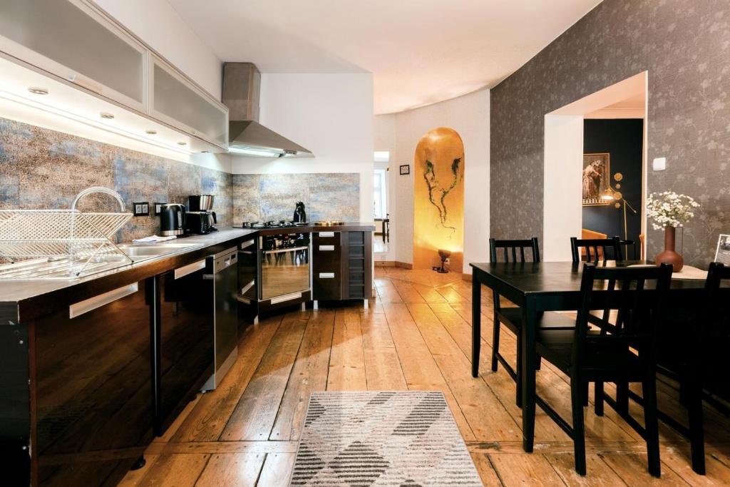 Kuchyňa alebo kuchynka v ubytovaní Prime Location Apartment