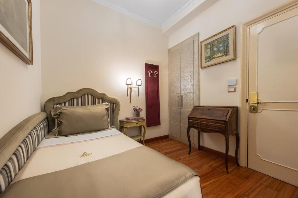 Postel nebo postele na pokoji v ubytování Hotel Forum