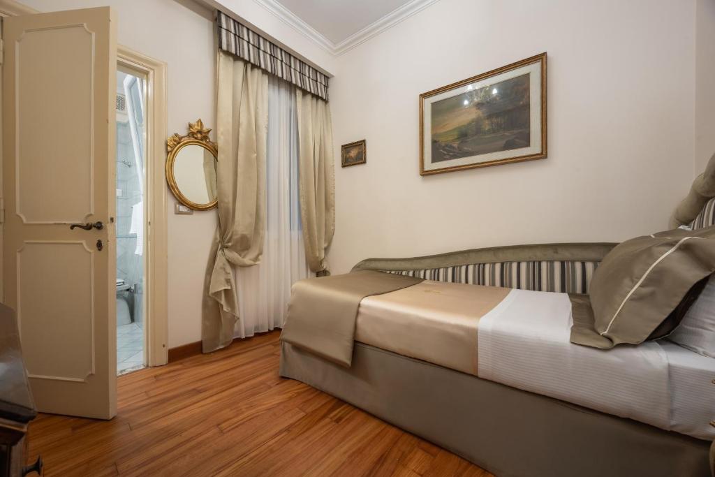 Postel nebo postele na pokoji v ubytování Hotel Forum