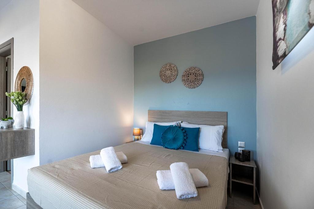 Łóżko lub łóżka w pokoju w obiekcie Aperanto Galazio Apartment