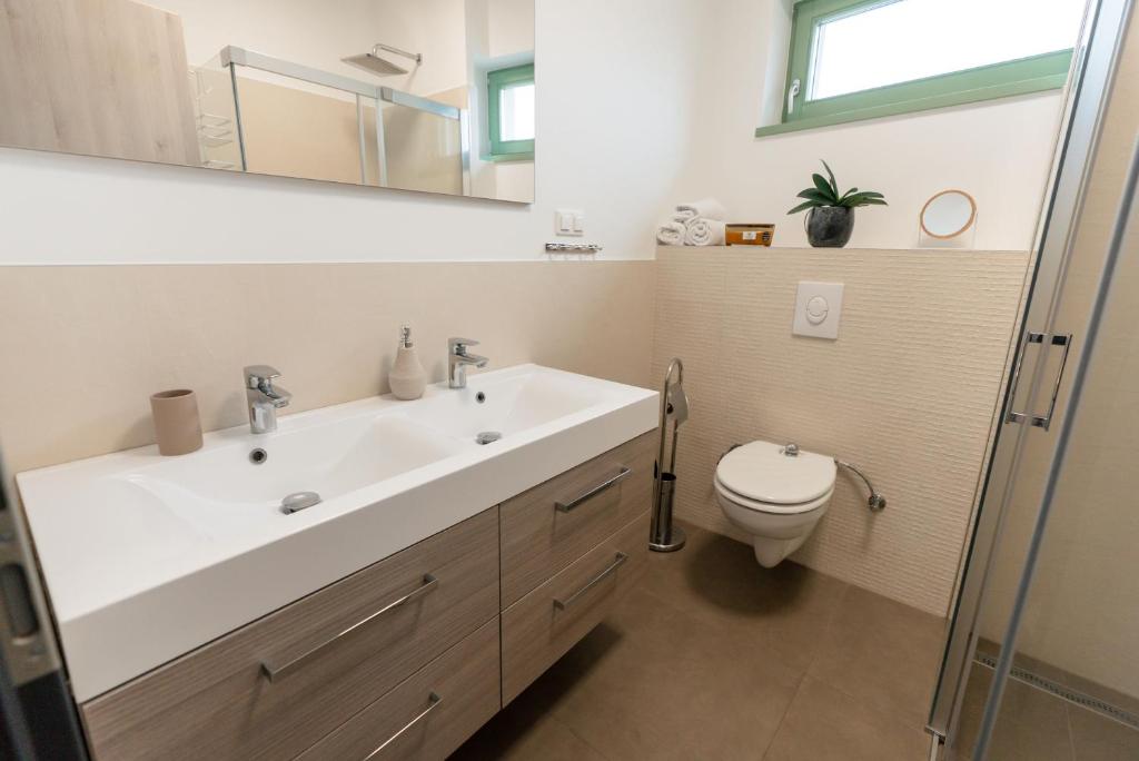 Kúpeľňa v ubytovaní Jókai Apartman