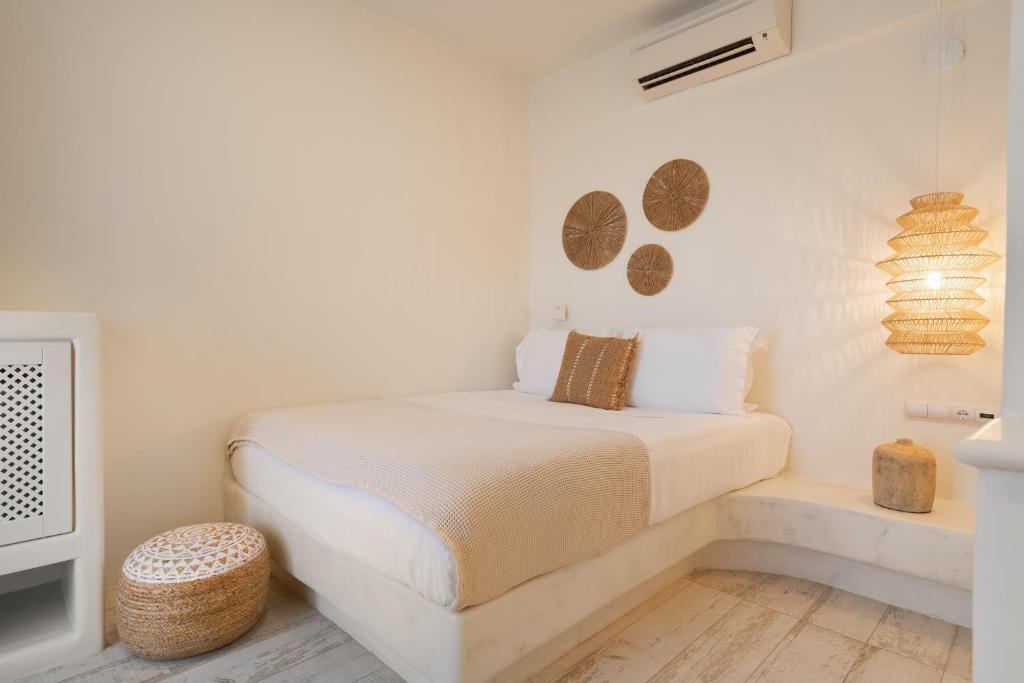 Кровать или кровати в номере Finikas Hotel