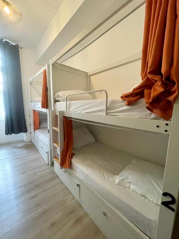 Postel nebo postele na pokoji v ubytování Le Couvent - Hostel