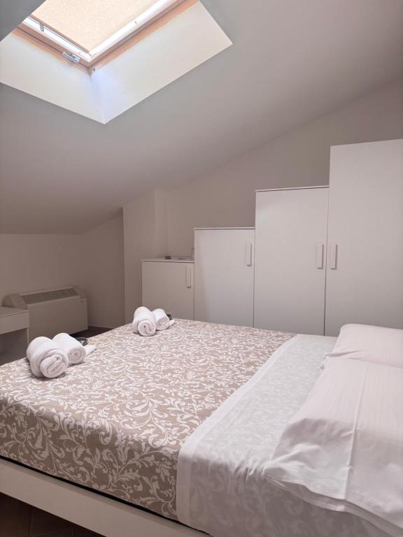 Postel nebo postele na pokoji v ubytování Vecchio Frantoio Villa Rosa