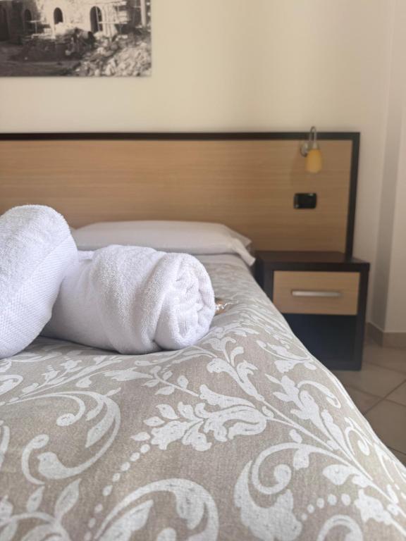 Postel nebo postele na pokoji v ubytování Vecchio Frantoio Villa Rosa