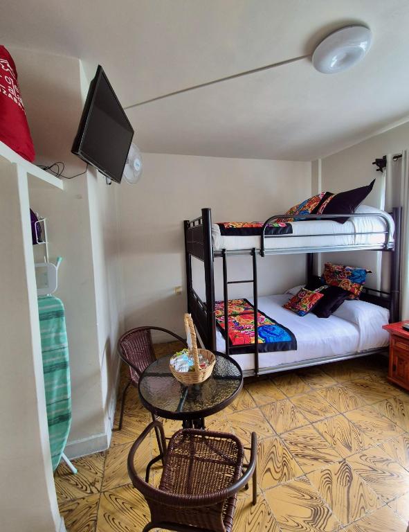 Postel nebo postele na pokoji v ubytování Hotel Catalina