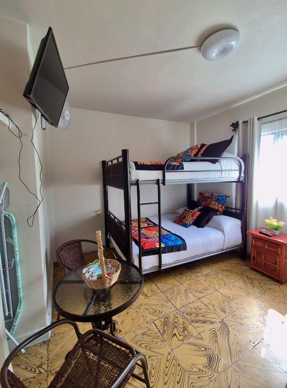 Postel nebo postele na pokoji v ubytování Hotel Catalina