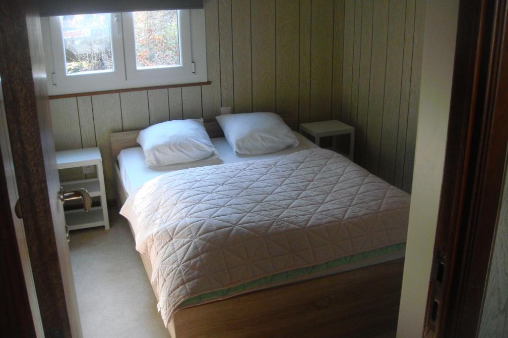 Postel nebo postele na pokoji v ubytování Chalet Sorgenfri