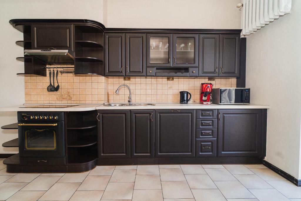 Kuchyňa alebo kuchynka v ubytovaní TOTU HOME Classic Apartment Gdynia