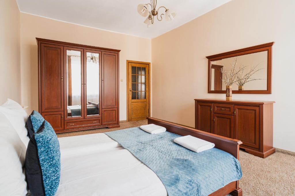 Posteľ alebo postele v izbe v ubytovaní TOTU HOME Classic Apartment Gdynia