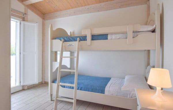 Postel nebo postele na pokoji v ubytování Agricampeggio Alessandra