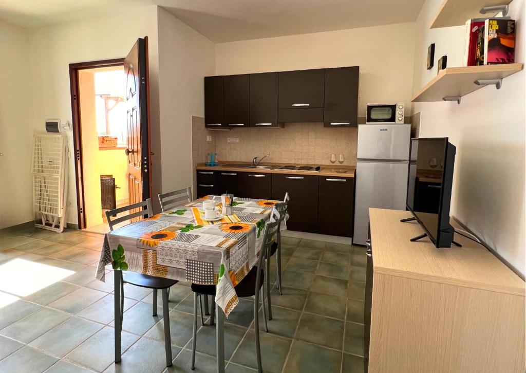 Kuchyň nebo kuchyňský kout v ubytování Residence Talamone Il Poderino