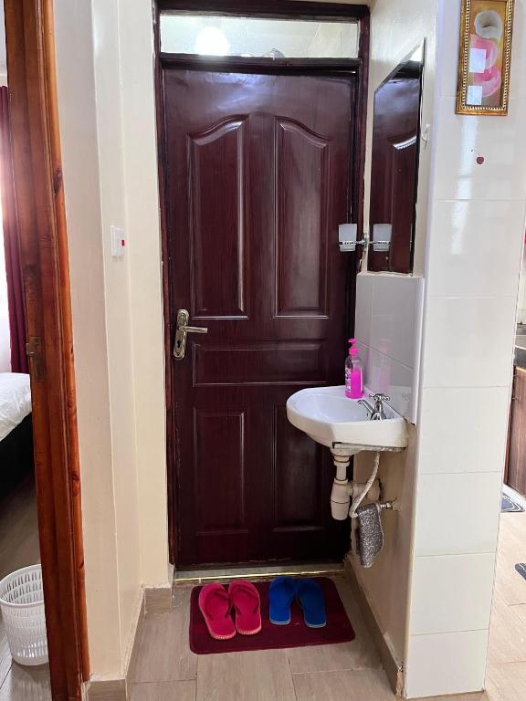Koupelna v ubytování Lora Homes