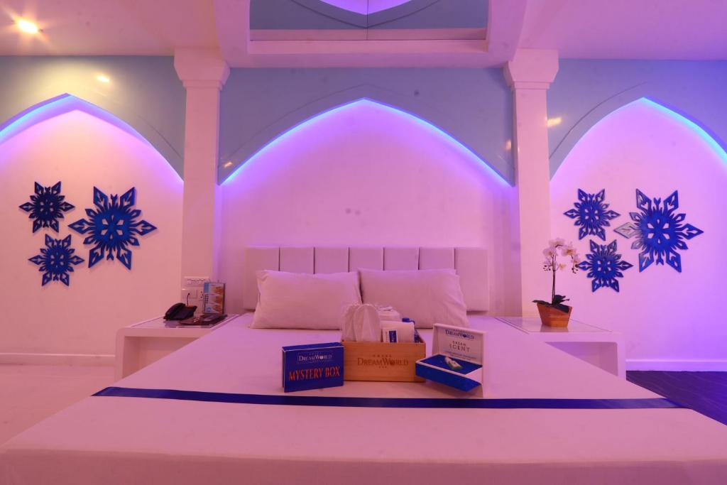 Postel nebo postele na pokoji v ubytování Hotel Dreamworld East Ortigas
