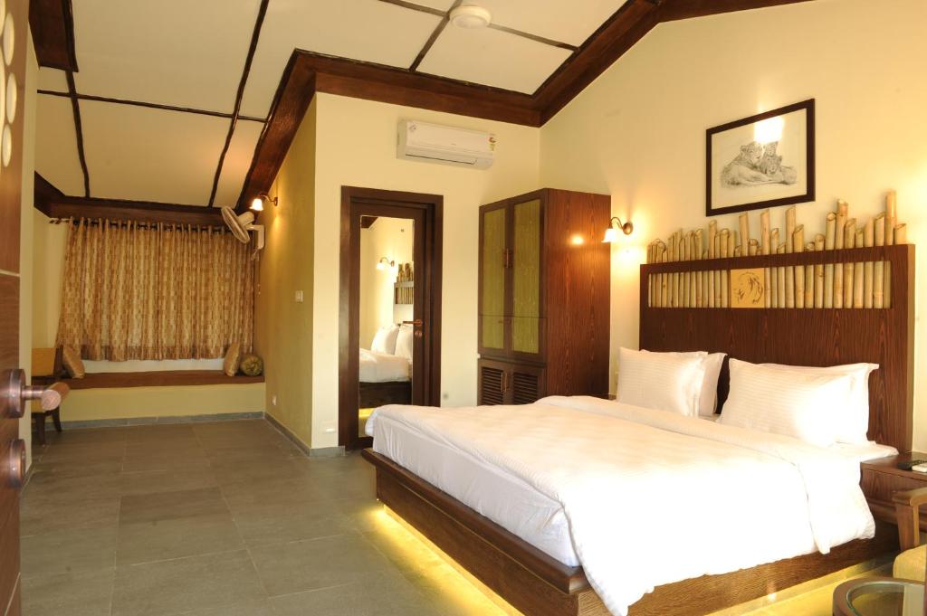 Letto o letti in una camera di Asiatic Lion Lodge