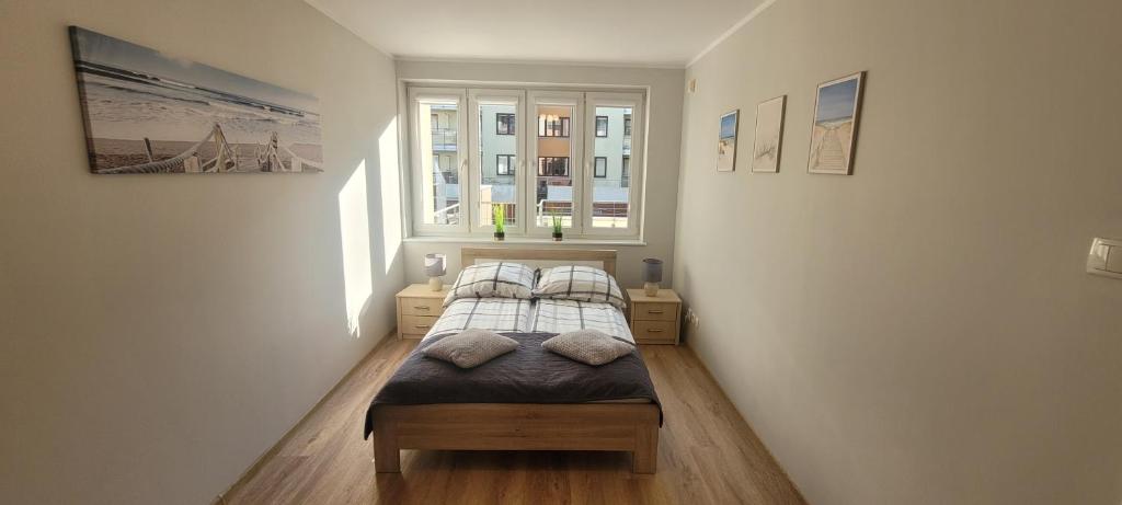 Posteľ alebo postele v izbe v ubytovaní Apartament Karolina - Zielone Tarasy