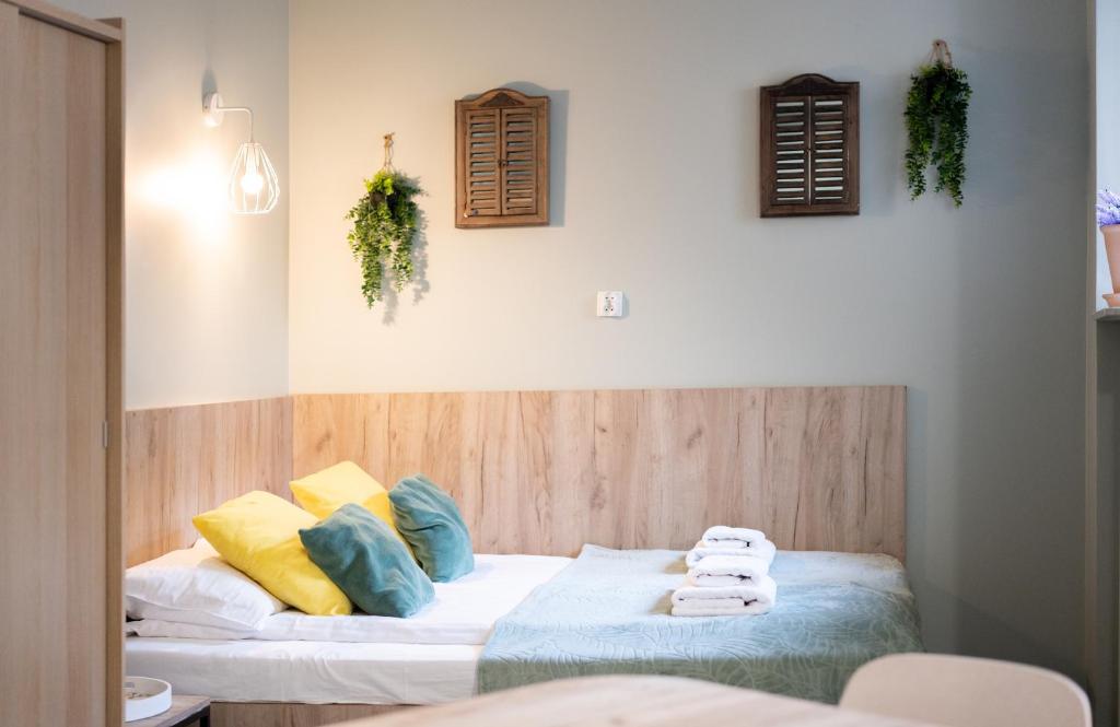 Posteľ alebo postele v izbe v ubytovaní Aparthotel przy Bulwarze by Rentoom