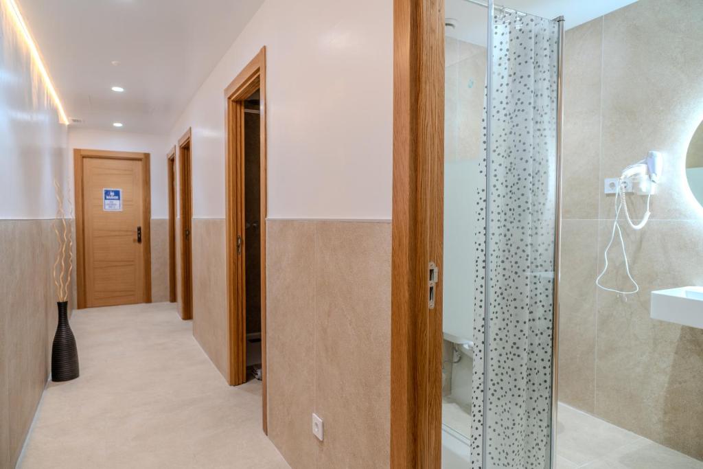 Koupelna v ubytování HolidaysBCN Rooms