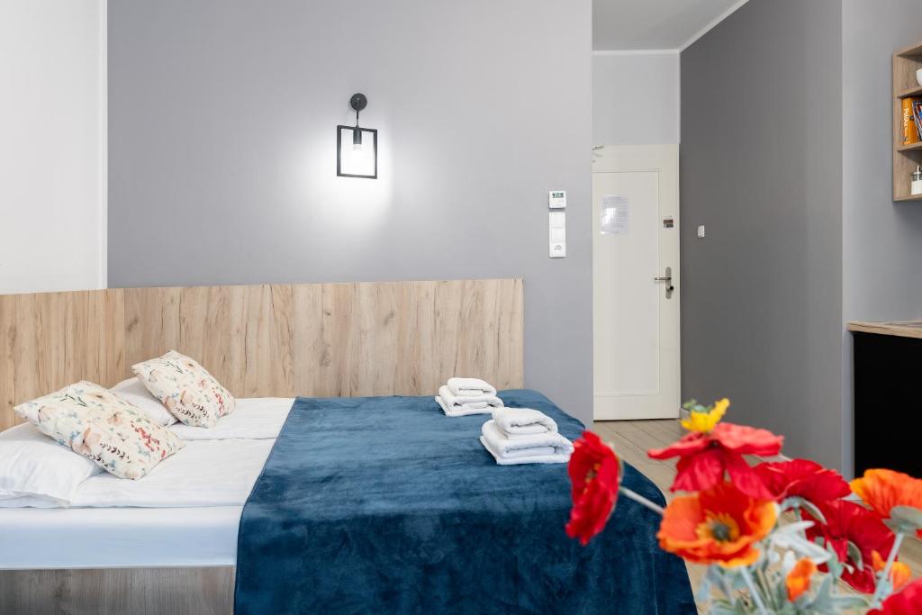 Posteľ alebo postele v izbe v ubytovaní Aparthotel przy Bulwarze by Rentoom