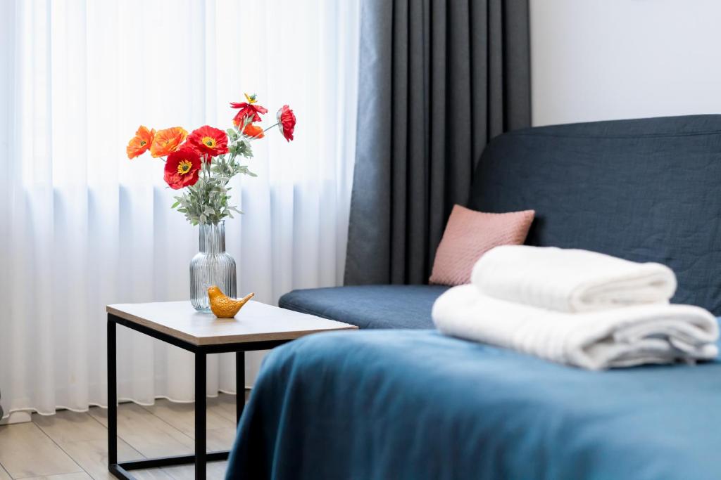 Posteľ alebo postele v izbe v ubytovaní Aparthotel przy Bulwarze by Rentoom