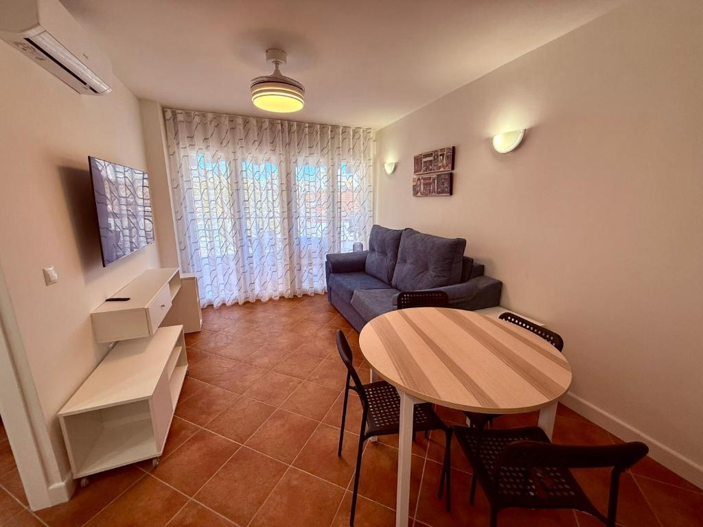 Posezení v ubytování APARTAMENTO EN EL CENTRO CERCA DE La PLAYA