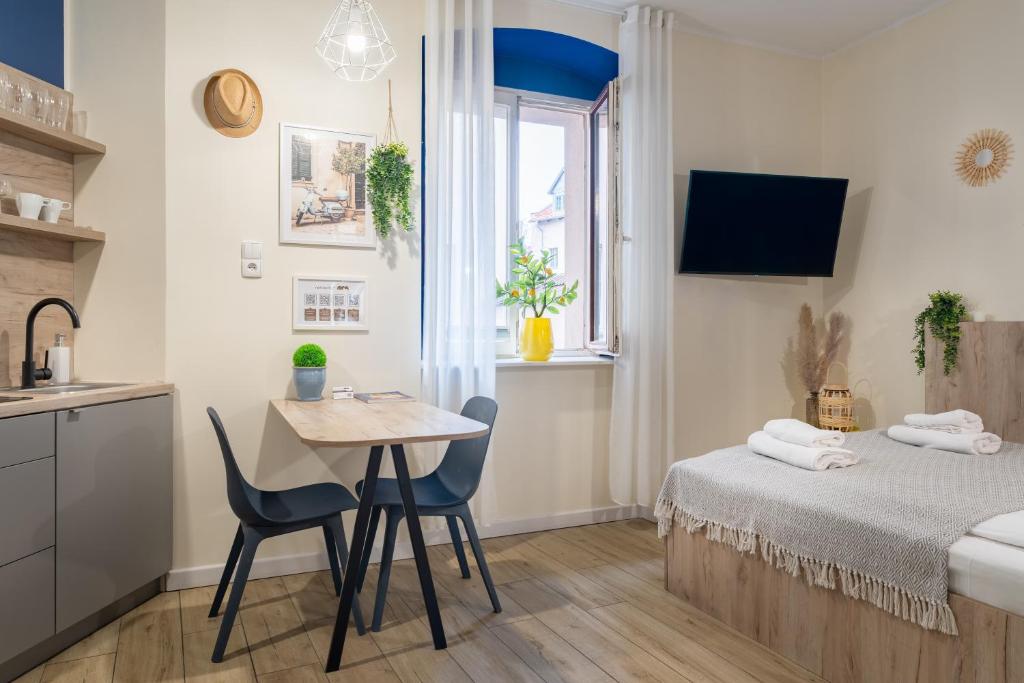 Posteľ alebo postele v izbe v ubytovaní Aparthotel przy Bulwarze by Rentoom