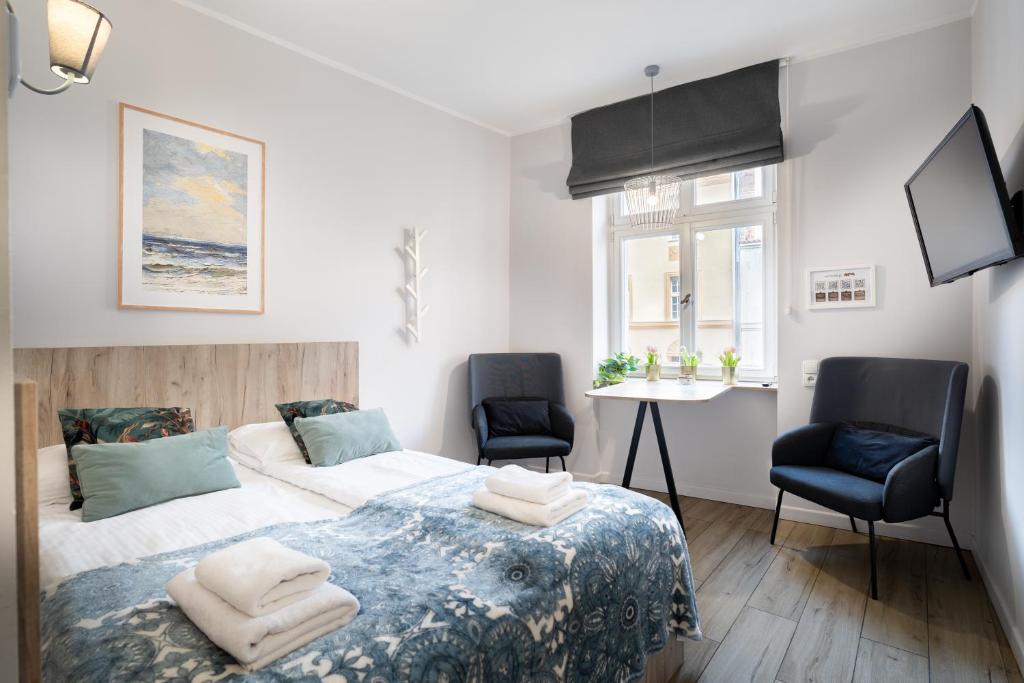 Posteľ alebo postele v izbe v ubytovaní Aparthotel przy Bulwarze by Rentoom