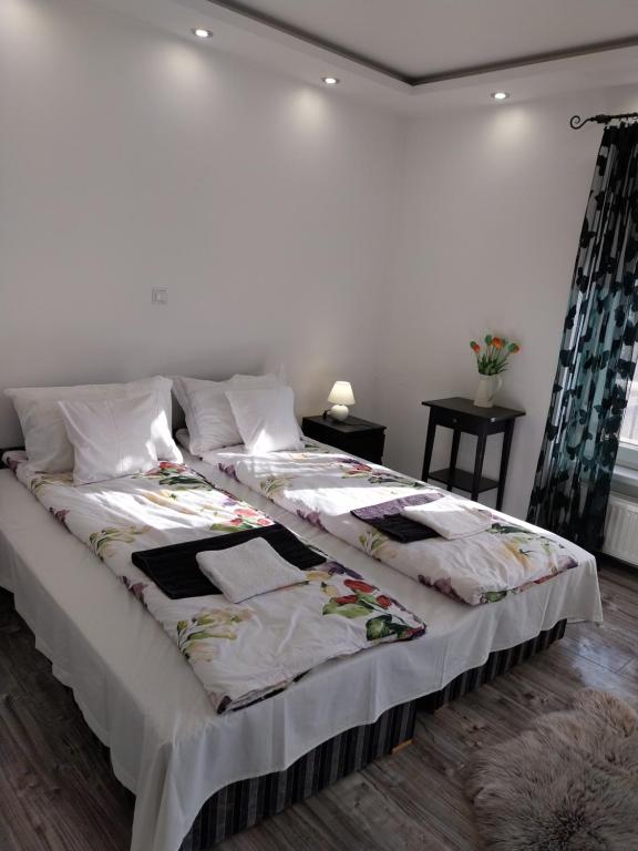 Postel nebo postele na pokoji v ubytování Rozinka apartman