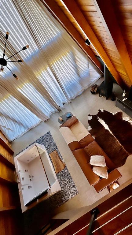 Posezení v ubytování Alpinada Cabanas