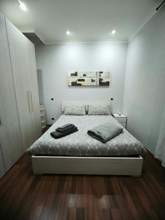 Кровать или кровати в номере Casa Vacanza Giorgia