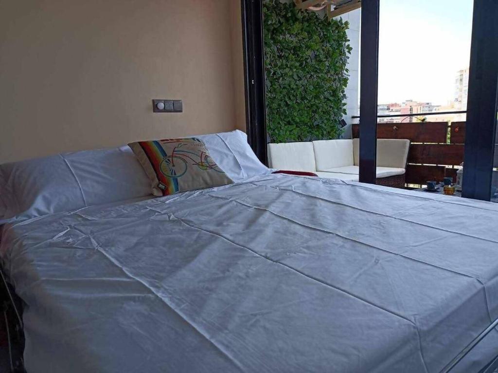 Posteľ alebo postele v izbe v ubytovaní STAR Apto Torremolinos WiFi Terraza Centro