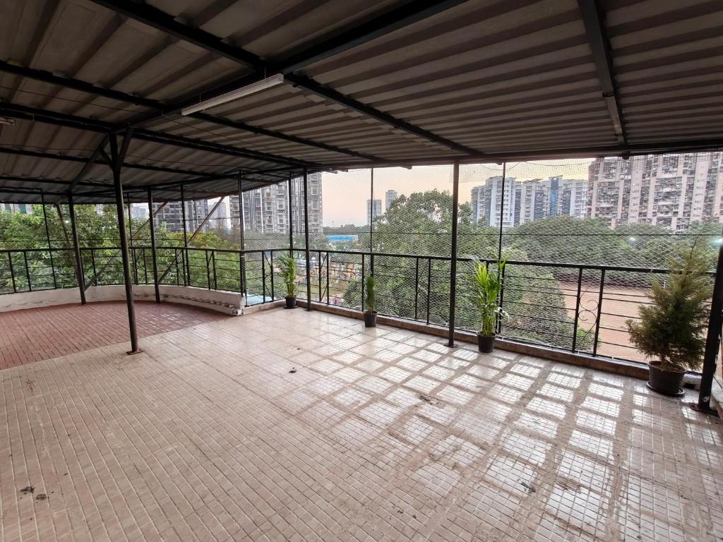 Μπαλκόνι ή βεράντα στο Garden View Terrace 1 BHK in Sanpada, Navi Mumbai