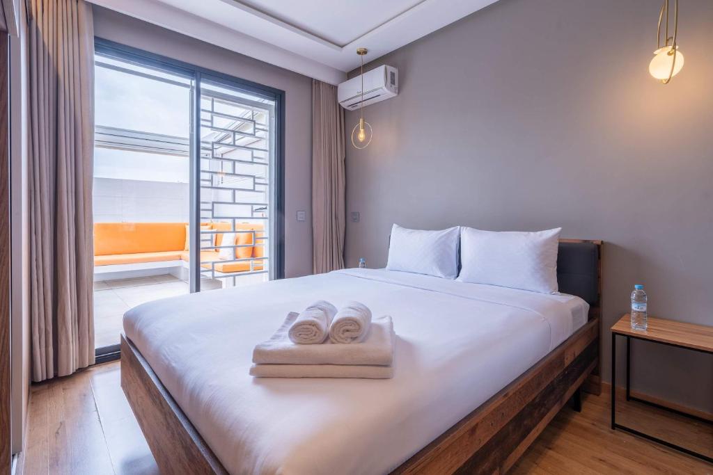 Katil atau katil-katil dalam bilik di Studio Cosy avec Piscine et Terrasse