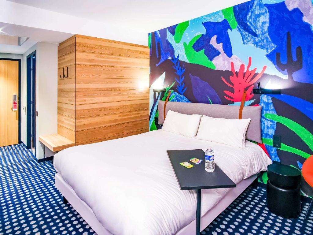 Postel nebo postele na pokoji v ubytování ibis Styles Albertville