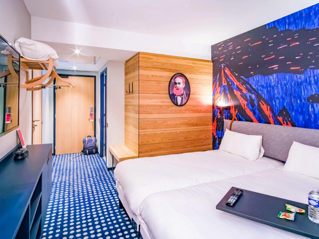 Postel nebo postele na pokoji v ubytování ibis Styles Albertville