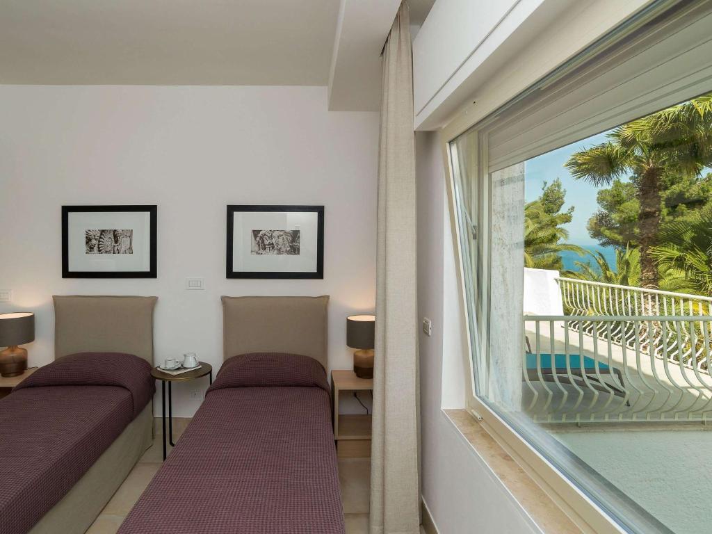 Posezení v ubytování Hotel Baia Delle Zagare