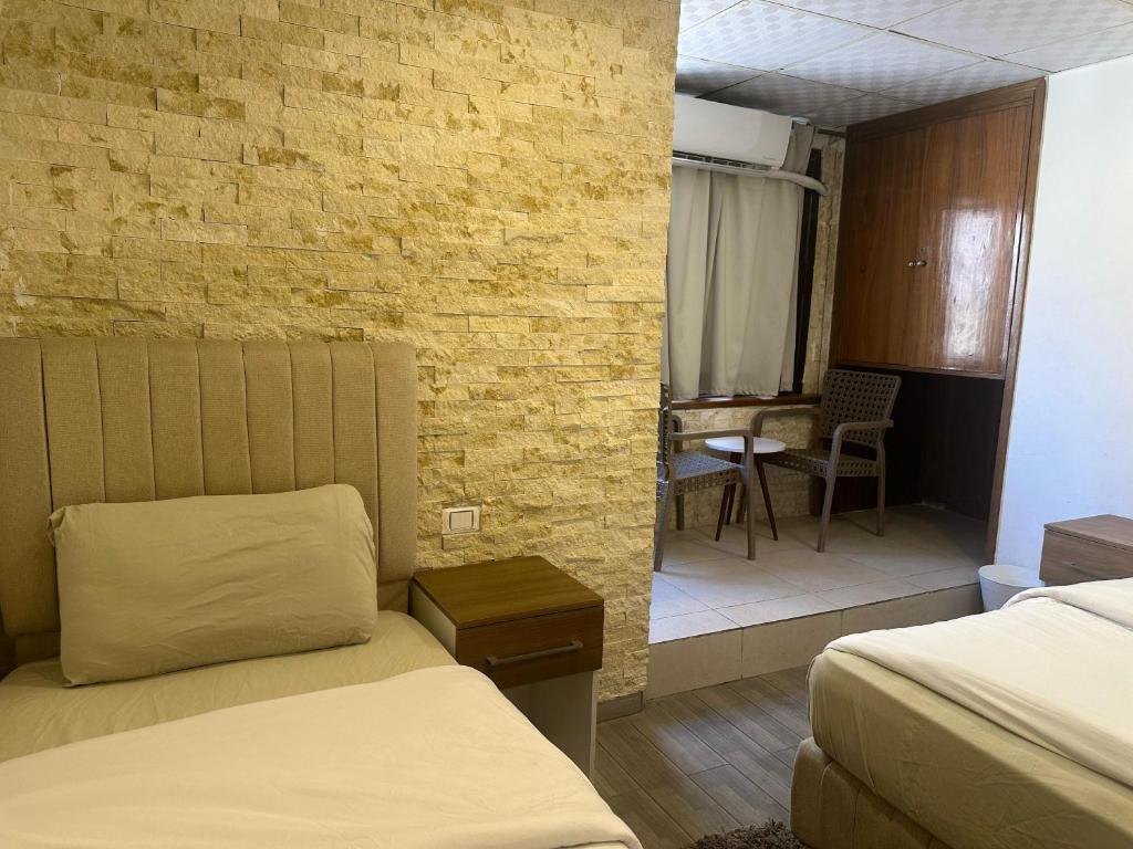 Postel nebo postele na pokoji v ubytování cairo jordan hotel
