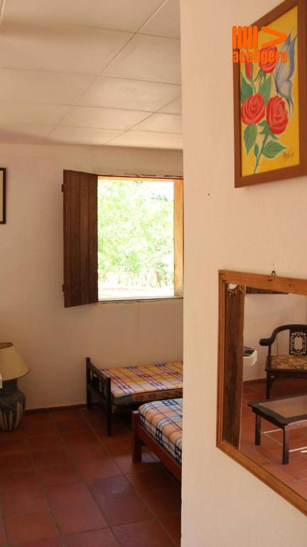 Postel nebo postele na pokoji v ubytování Pousada Casarão do Jabre: História e Natureza JABRE1