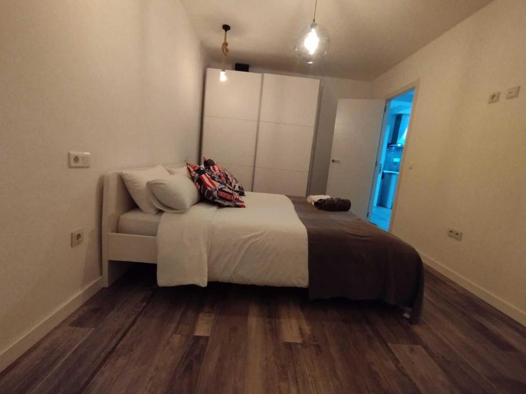 Postel nebo postele na pokoji v ubytování Plazamar Centro Apto 1 Dorm 3 Huésped Playa WiFi