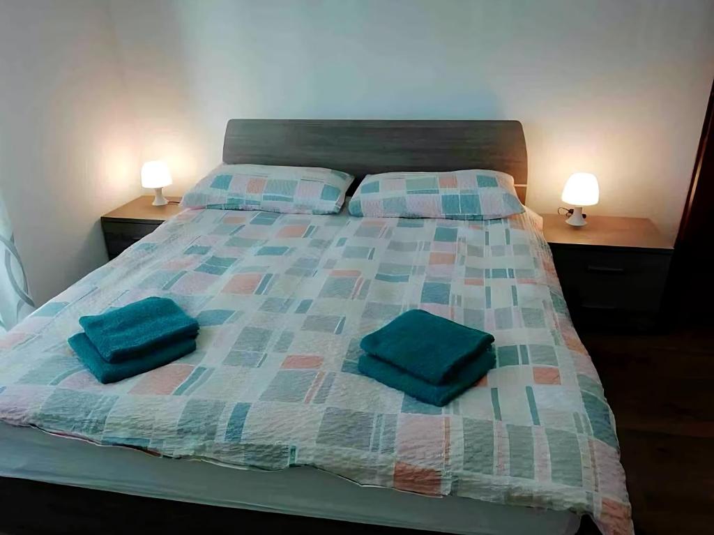 A bed or beds in a room at Gorizia Central Luxe Apartment 6 posti letto
