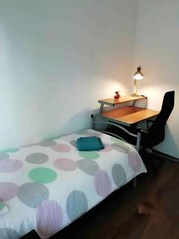 A bed or beds in a room at Gorizia Central Luxe Apartment 6 posti letto