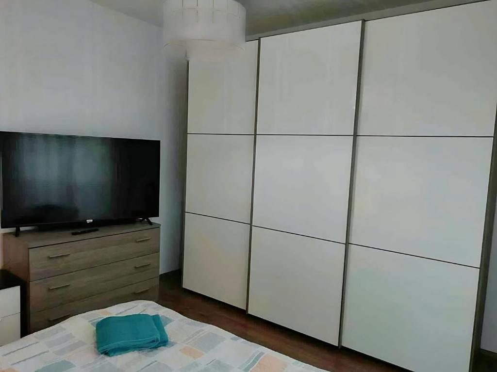 A television and/or entertainment centre at Gorizia Central Luxe Apartment 6 posti letto
